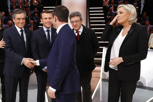 Macron, Le Pen clash in first French election TV debate